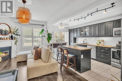 80 Palacebeach Trail, Hamilton, ON - Indoor Photo Showing Kitchen With Fireplace With Upgraded Kitchen