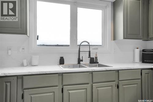 138 Stone Terrace, Saskatoon, SK - Indoor Photo Showing Kitchen With Double Sink