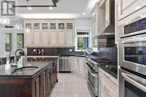 Stainless steel appliances & endless storage space - 1623 Claymor Avenue, Ottawa, ON - Indoor Photo Showing Kitchen With Stainless Steel Kitchen With Upgraded Kitchen