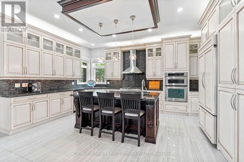 Massive breakfast bar island & custom fixture. - 1623 Claymor Avenue, Ottawa, ON - Indoor Photo Showing Kitchen With Upgraded Kitchen