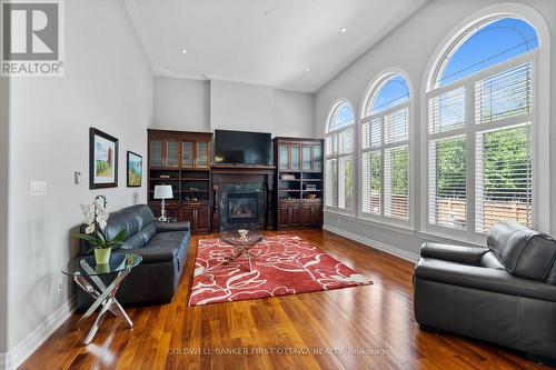 3 massive archway windows & soaring ceilings. - 1623 Claymor Avenue, Ottawa, ON - Indoor Photo Showing Living Room With Fireplace