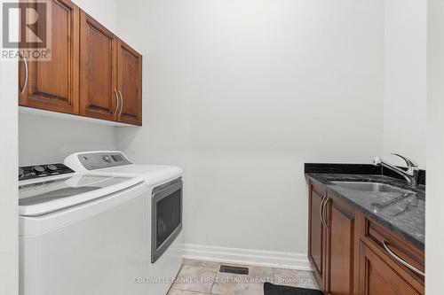 Main floor laundry room w sink & storage space. - 1623 Claymor Avenue, Ottawa, ON - Indoor Photo Showing Laundry Room