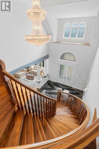 Grand staircase to the 2nd lvl w custom Chandelier - 1623 Claymor Avenue, Ottawa, ON - Indoor Photo Showing Other Room