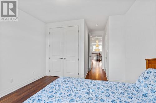 Dbl door closet & fixture above. - 1623 Claymor Avenue, Ottawa, ON - Indoor Photo Showing Bedroom