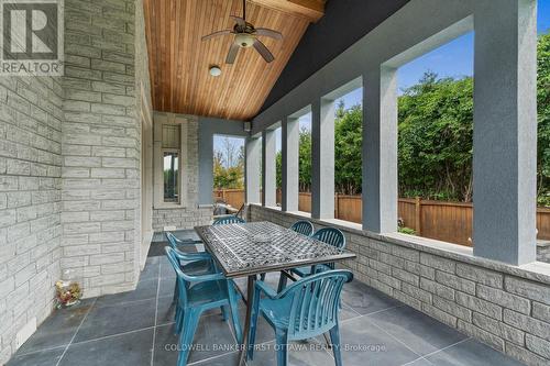 Custom built covered lanaii w ceiling fan. - 1623 Claymor Avenue, Ottawa, ON - Outdoor With Deck Patio Veranda With Exterior