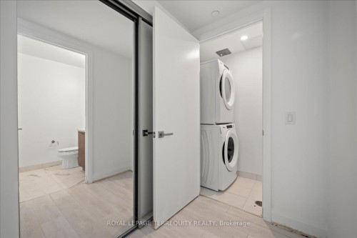 1406-33 Frederick Todd Way, Toronto, ON - Indoor Photo Showing Laundry Room