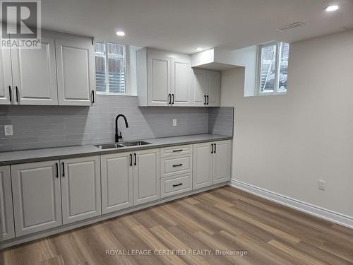 Basement - 974 Seivert Place, Milton, ON - Indoor Photo Showing Kitchen With Double Sink