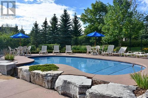 223 - 170 Snowbridge Way, Blue Mountains, ON - Outdoor With In Ground Pool With Backyard