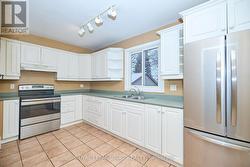 Notice the stainless steel appliances. - 