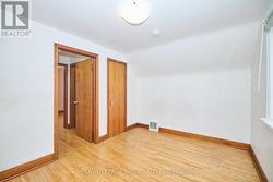 This room offers a walk-in closet. - 