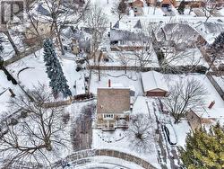 Aerial view of house, driveway and backyard. - 
