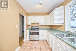 Kitchen with an abundance of cabinets. - 