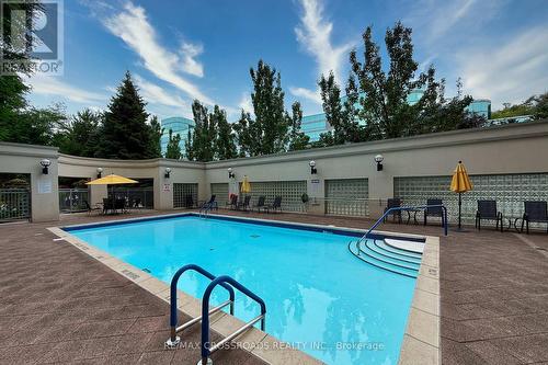 210 - 10 Old York Mills Road, Toronto, ON - Outdoor With In Ground Pool