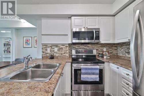 201 - 920 Sheppard Avenue W, Toronto, ON - Indoor Photo Showing Kitchen With Double Sink