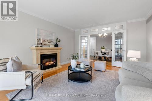 407 - 250 Pall Mall Street, London East (East F), ON - Indoor Photo Showing Living Room With Fireplace