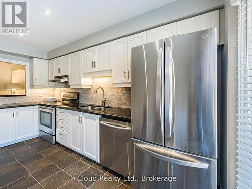 16 - 1100 Queens Avenue, Oakville, ON - Indoor Photo Showing Kitchen With Double Sink With Upgraded Kitchen