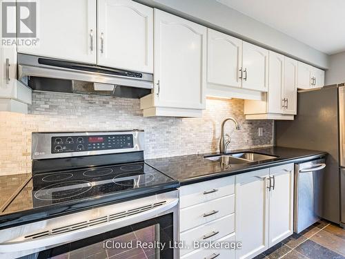 16 - 1100 Queens Avenue, Oakville, ON - Indoor Photo Showing Kitchen With Double Sink