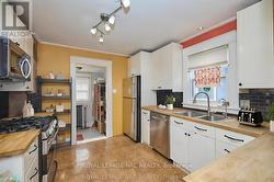 Kitchen with access to mudroom to backyard - 