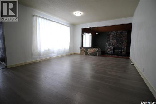 Wills Acreage, Frontier, SK - Indoor Photo Showing Living Room With Fireplace