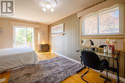 The room also offers a large wall to wall closet. - 