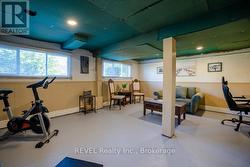 It is a great size room with large bright windows. - 