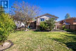 The backyard is fully fenced. - 