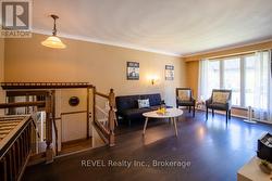 The large windows bring in lots of natural light! - 