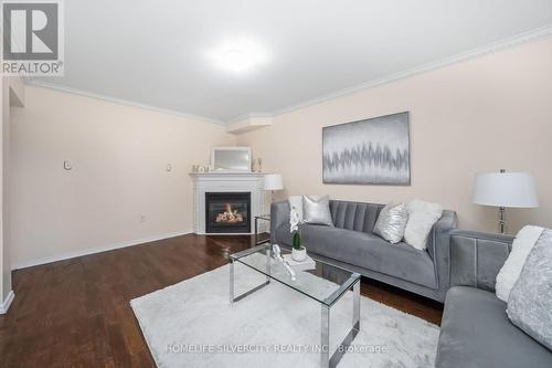 16 Coralreef Crescent, Brampton, ON - Indoor Photo Showing Living Room With Fireplace
