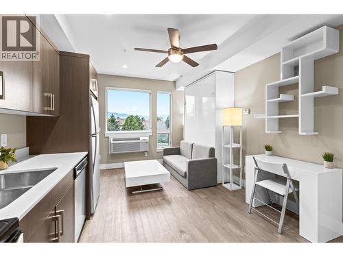 Smart & stylish - 925 Leon Avenue Unit# 430, Kelowna, BC - Indoor Photo Showing Kitchen With Double Sink