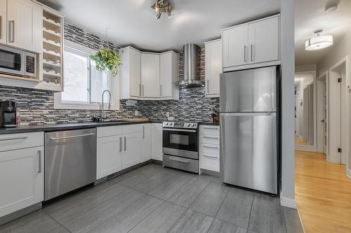 Kitchen - 50 Av. De Galais, Laval (Laval-Des-Rapides), QC - Indoor Photo Showing Kitchen With Upgraded Kitchen