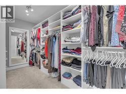 generous walk-in with custom built ins - 