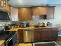 3 360 Studer Street, La Ronge, SK  - Indoor Photo Showing Kitchen With Stainless Steel Kitchen 