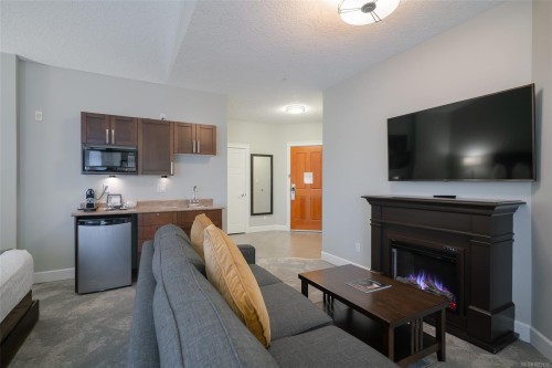 310D-1730 Riverside Lane, Courtenay, BC - Indoor With Fireplace