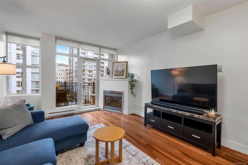 N607-737 Humboldt St, Victoria, BC - Indoor Photo Showing Living Room With Fireplace