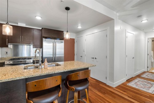 N607-737 Humboldt St, Victoria, BC - Indoor Photo Showing Kitchen With Stainless Steel Kitchen With Double Sink With Upgraded Kitchen