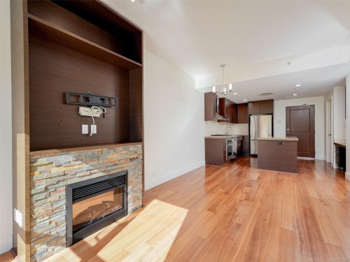 218-1400 Lynburne Pl, Langford, BC - Indoor Photo Showing Living Room With Fireplace