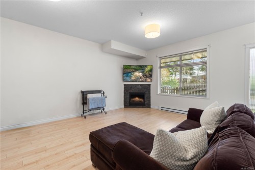 107-2111 Meredith Rd, Nanaimo, BC - Indoor Photo Showing Living Room With Fireplace