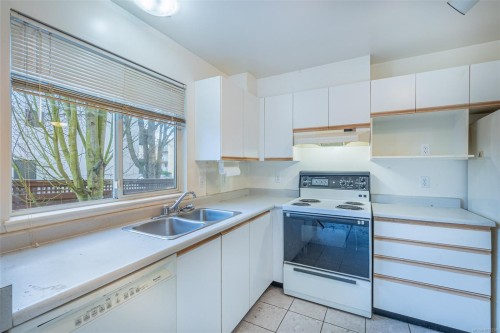 201-1055 Hillside Ave, Victoria, BC - Indoor Photo Showing Kitchen With Double Sink