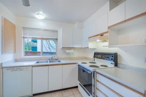 201-1055 Hillside Ave, Victoria, BC - Indoor Photo Showing Kitchen With Double Sink