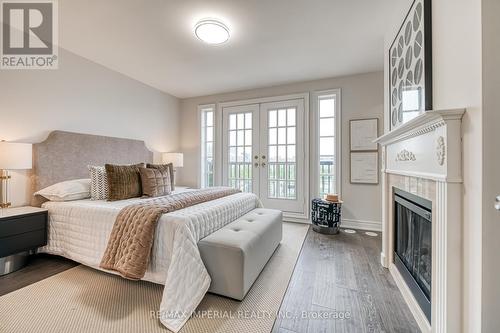 21 Mackenzie'S Stand Avenue, Markham, ON - Indoor Photo Showing Bedroom With Fireplace