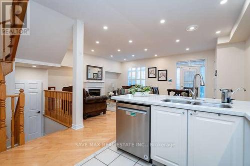 3452 Eglinton Avenue W, Mississauga, ON - Indoor Photo Showing Kitchen With Fireplace With Double Sink