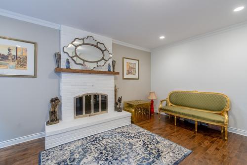 Salle familiale - 990 Rue Renoir, Brossard, QC - Indoor Photo Showing Other Room With Fireplace