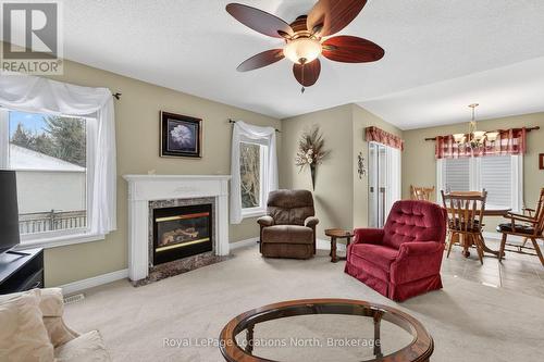 15 Princess Point Drive, Wasaga Beach, ON - Indoor Photo Showing Living Room With Fireplace