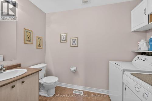 Main floor 2 pc + laundry - 15 Princess Point Drive, Wasaga Beach, ON - Indoor Photo Showing Bathroom