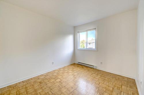 Chambre à coucher - 9745 Rue Riverin, Brossard, QC - Indoor Photo Showing Other Room