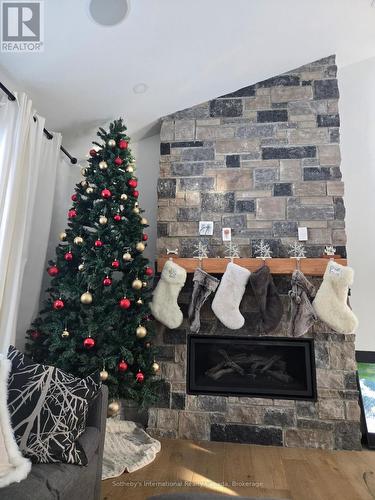 Cozy Gas Fireplace - 31 Slalom Gate Road, Collingwood, ON - Indoor With Fireplace