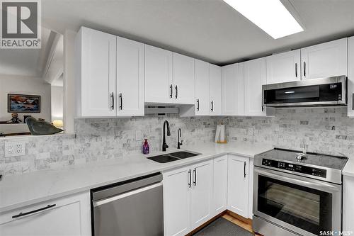 101 2217 Angus Street, Regina, SK - Indoor Photo Showing Kitchen With Stainless Steel Kitchen With Double Sink With Upgraded Kitchen