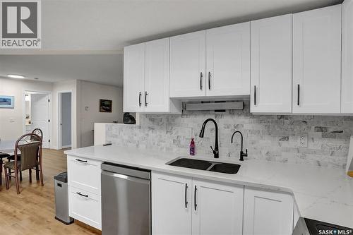 101 2217 Angus Street, Regina, SK - Indoor Photo Showing Kitchen With Double Sink
