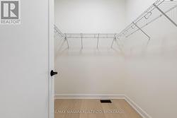 Primary Bedroom's Walk-in closet - 