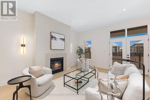 Living Room - 6 Butternut Crescent, Fort Erie (Ridgeway), ON - Indoor Photo Showing Living Room With Fireplace